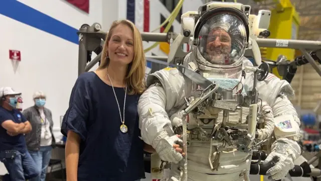 Stacey Morgan and her husband Andrew Morgan, pictured wearing a space suit. Andrew went on a mission to the International Space Station in 2019