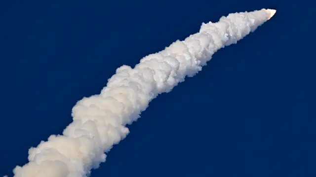 Rocket with the Orion crew capsule, ascends after lift off