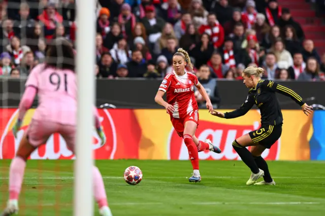 Gwinn runs past her oppsite full-back