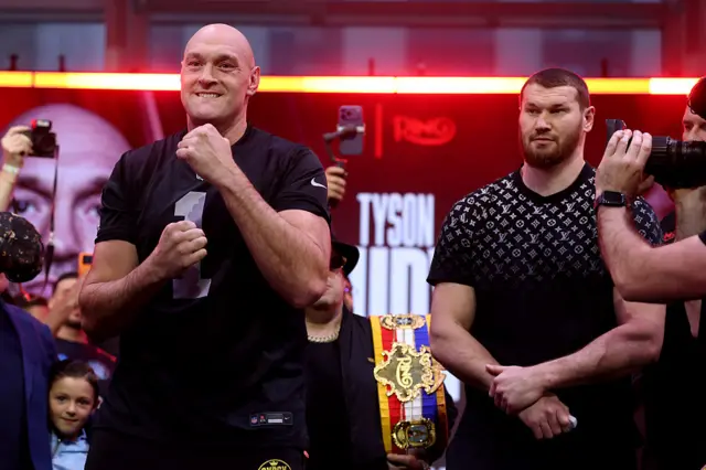 Tyson Fury faces off with Arslanbek Makhmudov at a weigh-in