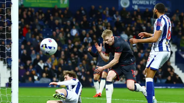 Millwall's Josh Coburn rues his missed chance against West Brom