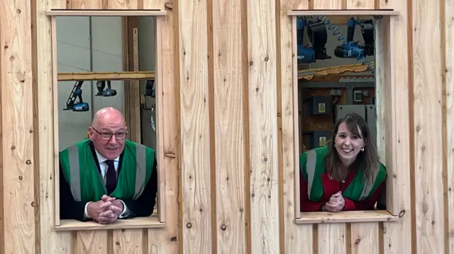SNP leader John Swinney at house builder Makar near Inverness with SNP candidate Emma Roddick
