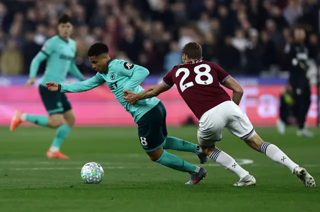 Gomes dribbles in midfield