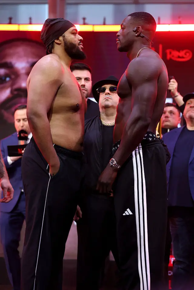Jeamie 'TKV' Tshikeva and Richard Riakporhe face off at a weigh-in