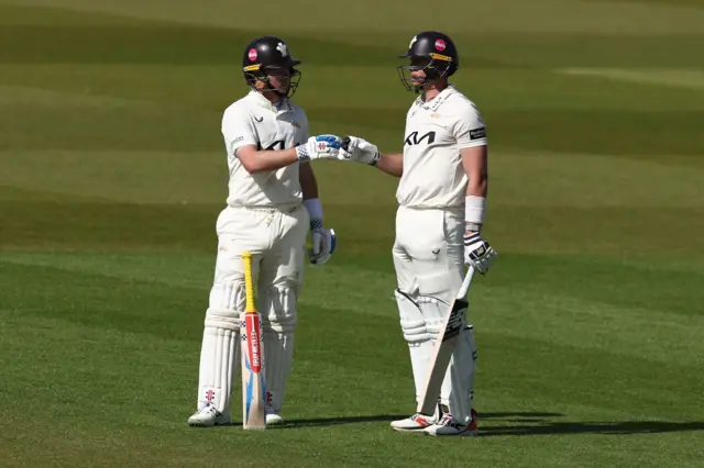 Ollie Pope and Jamie Smith fist bump
