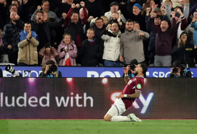 Catdellanos slides on his knees to celebrate his goal