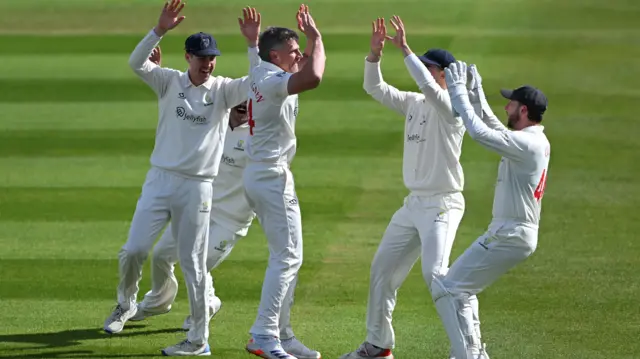 Glamorgan players celebrate the wicket of Notts opener Haseeb Hameed