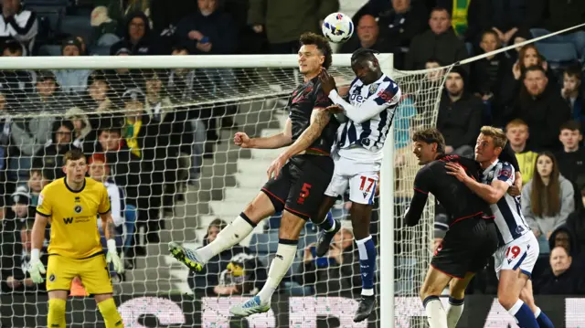 Jake Cooper of Millwall battles for a header with Ousmane Diakite of West Bromwich Albion during the Sky Bet Championship match between West Bromwich Albion and Millwall at The Hawthorns