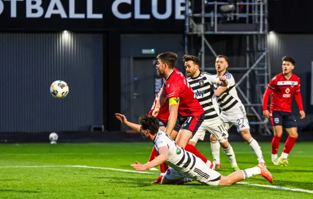 Queen's Park's Aidan Connolly scores