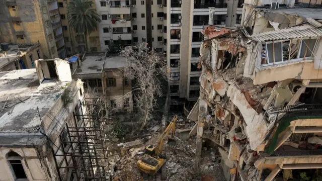 Heavy machinery operates at the site of an Israeli strike carried out on Wednesday, in Ain Al Mraiseh in Beirut, Lebanon, April 9, 2026.