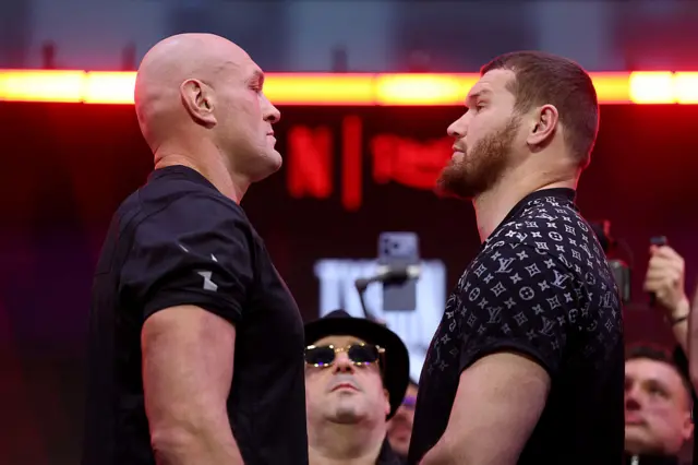 Tyson Fury faces off with Arslanbek Makhmudov at a weigh-in