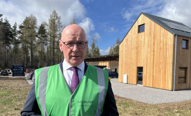 john swinney at a newbuild eco house