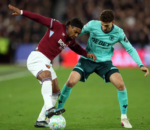 Traore tries to work his way down the wing