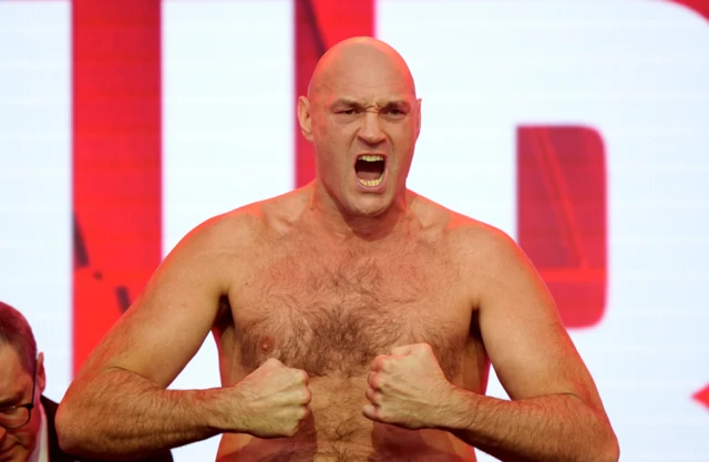 Tyson Fury weighs in