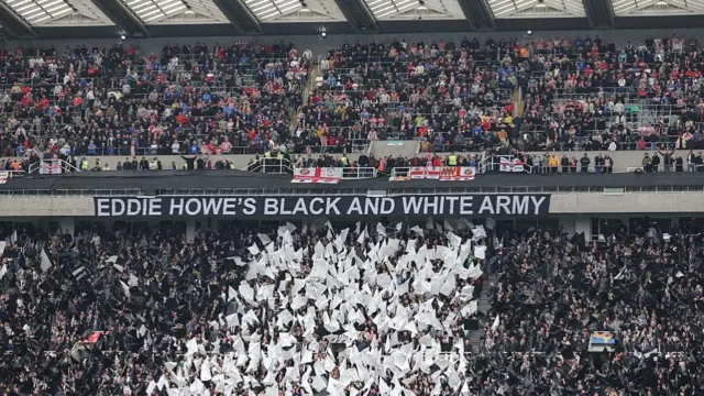 Fan banner which reads 'Eddie Howe's black and white army'