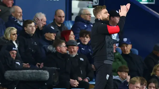 Interim West Bromwich Albion boss James Morrison applauds