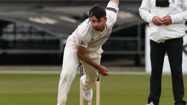 Ian Holland bowling for Leics