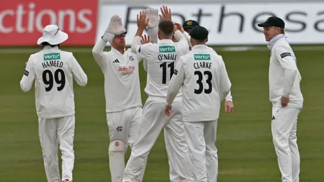 Nottinghamshire celebrate a wicket against Glamorgan
