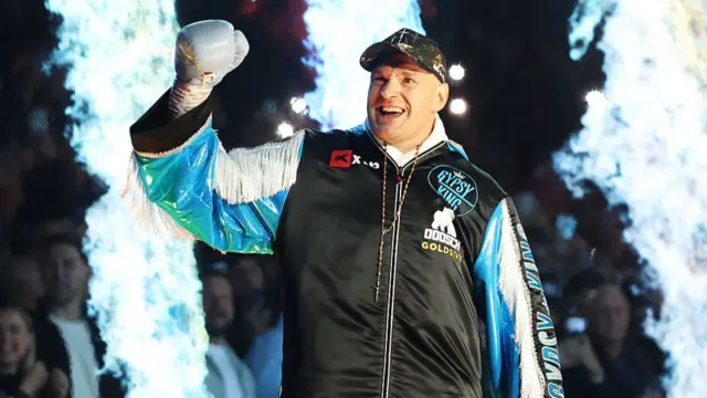 Tyson Fury walks to the ring