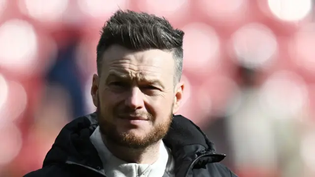 Middlesbrough boss Kim Hellberg looking on towards the supporters after the match