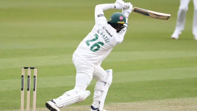 Rishi Patel plays a cover drive for Leicestershire at Surrey