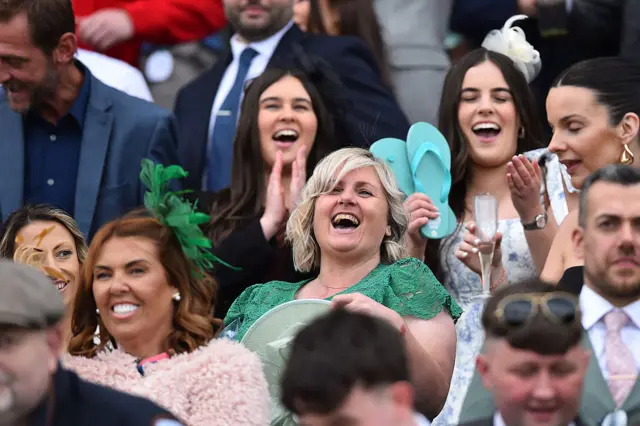 Spectators enjoying themselves at Aintree