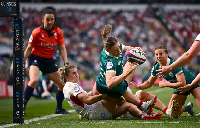 Anna McGann of Ireland scores her side's first try