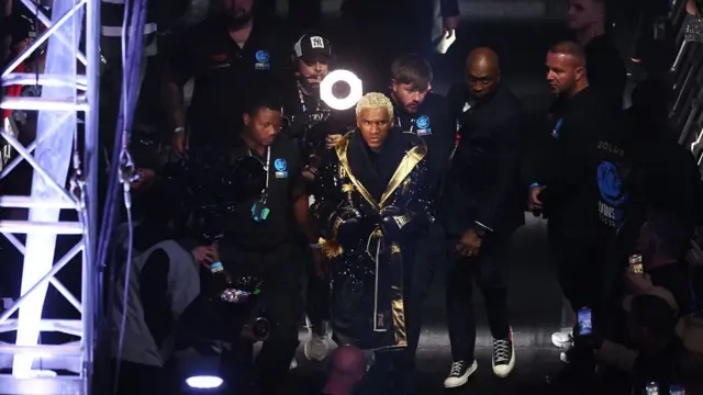 Conor Benn walks out