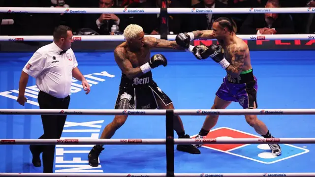 Conor Benn punches Regis Prograis