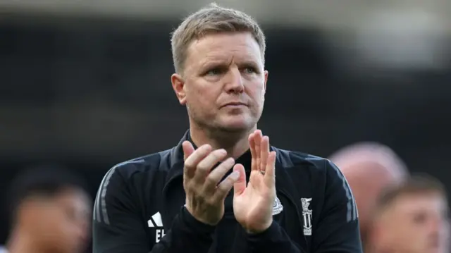 Eddie Howe, Manager of Newcastle United, acknowledges the fans