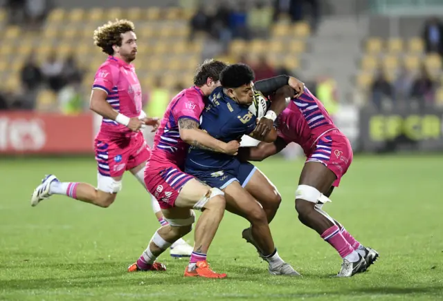 Dragons' Fetuli Paea carries the ball