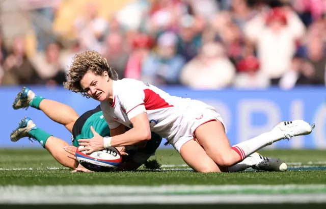 Ellie Kildunne of England scores a try which is later disallowed due to a knock on