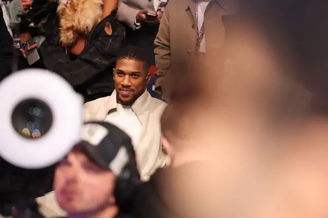 Anthony Joshua smiles