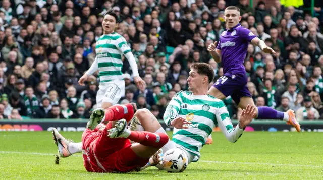 Celtic's Tomas Cvanvcara collides with St Mirren goalkeeper Shamal George
