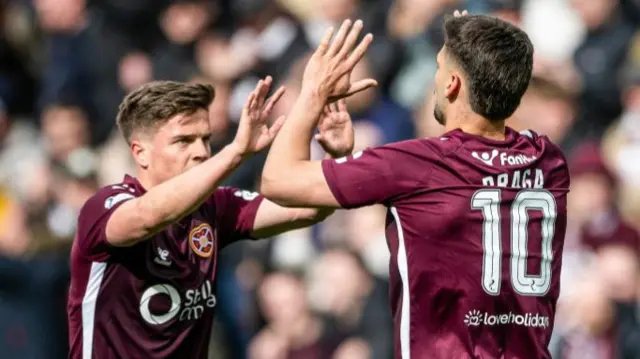 Hearts celebrate