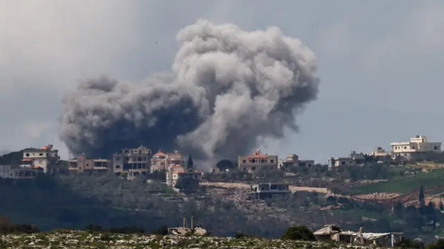 Smoke rises following an airstrike in Lebanon, as seen from Israeli side of the border, April 11.