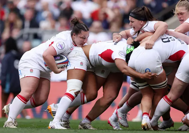 Amy Cockayne of England guides a maul to score her team's first try