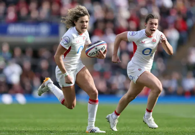Ellie Kildunne runs in for a try against Ireland