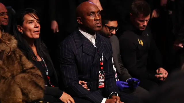 Nigel Benn sat ringside