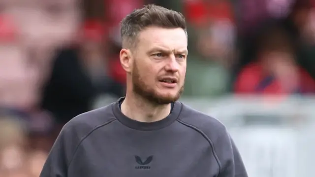 Kim Hellberg on the touchline