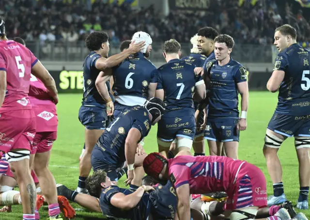Dragons players celebrate Harrison Keddie's try