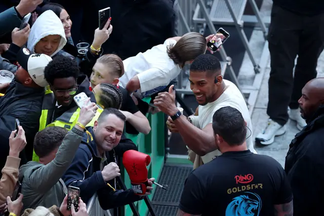 Anthony Joshua poses for pictures