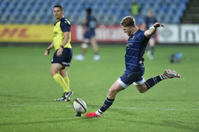 Dragons' Angus O'Brien kicks at goal