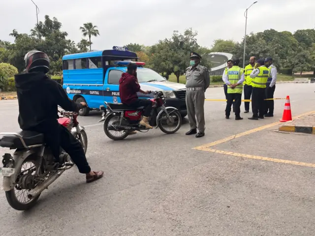 A police checkpoint in Islamabad ahead of US and Iran peace talks in Pakistan