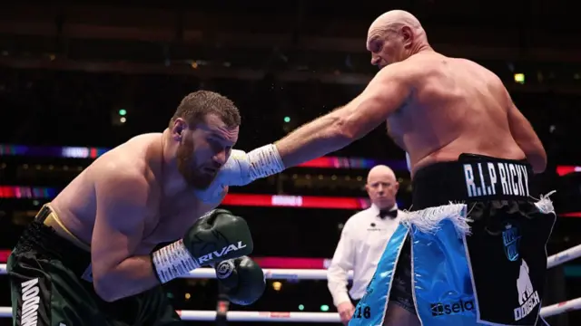 Tyson Fury punches Arslanbek Makhmudov