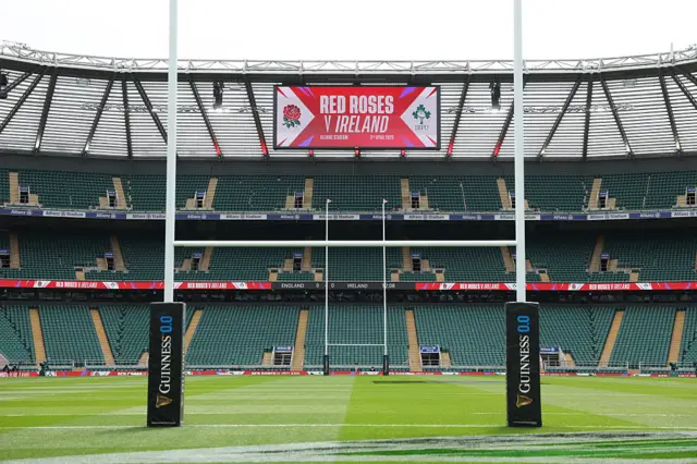 A stadium view with a sign saying England vs Ireland