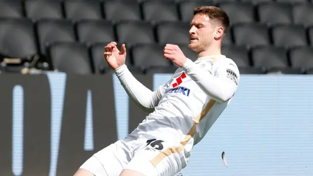 Ben Wiles celebrates his goal for MK Dons against Bromley