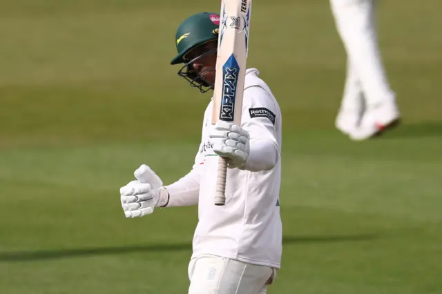 Rishi Patel raises his bat for Leicestershire