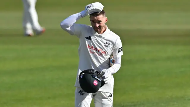 Joe Clarke with his helmet off after getting 100 against Glamorgan