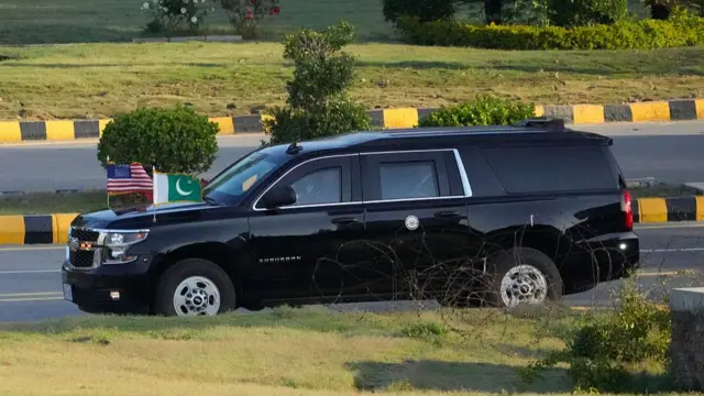 A vehicle drives as part of a motorcade believed to be carrying US Vice President JD Vance as he leaves from the Serena Hotel for Nur Khan air base to depart Pakistan.